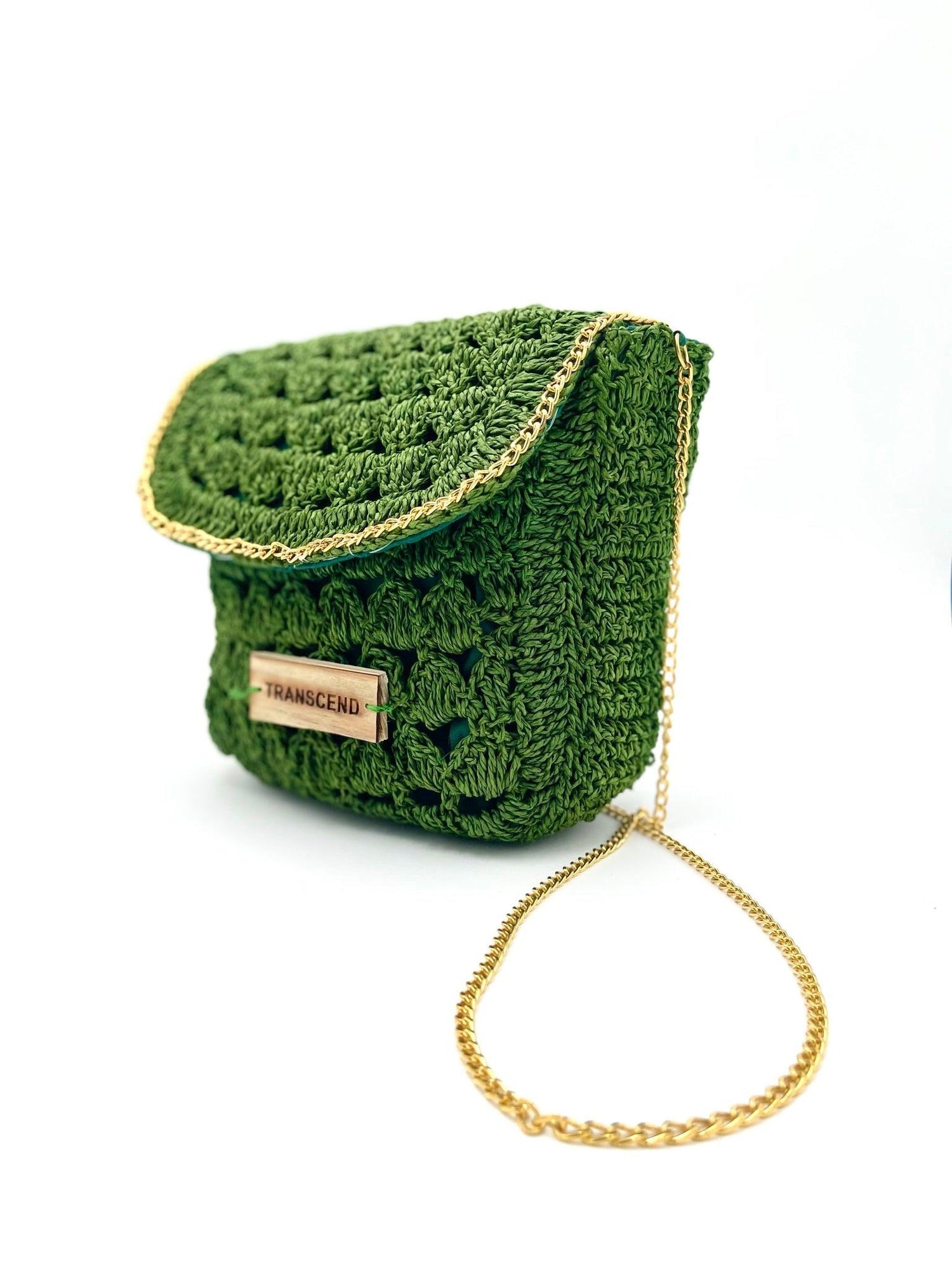 Green crossbody handbag made with raffia